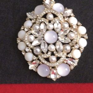 White Crystal Pearl simulated moonstone  with Gold Tone 36” chain.